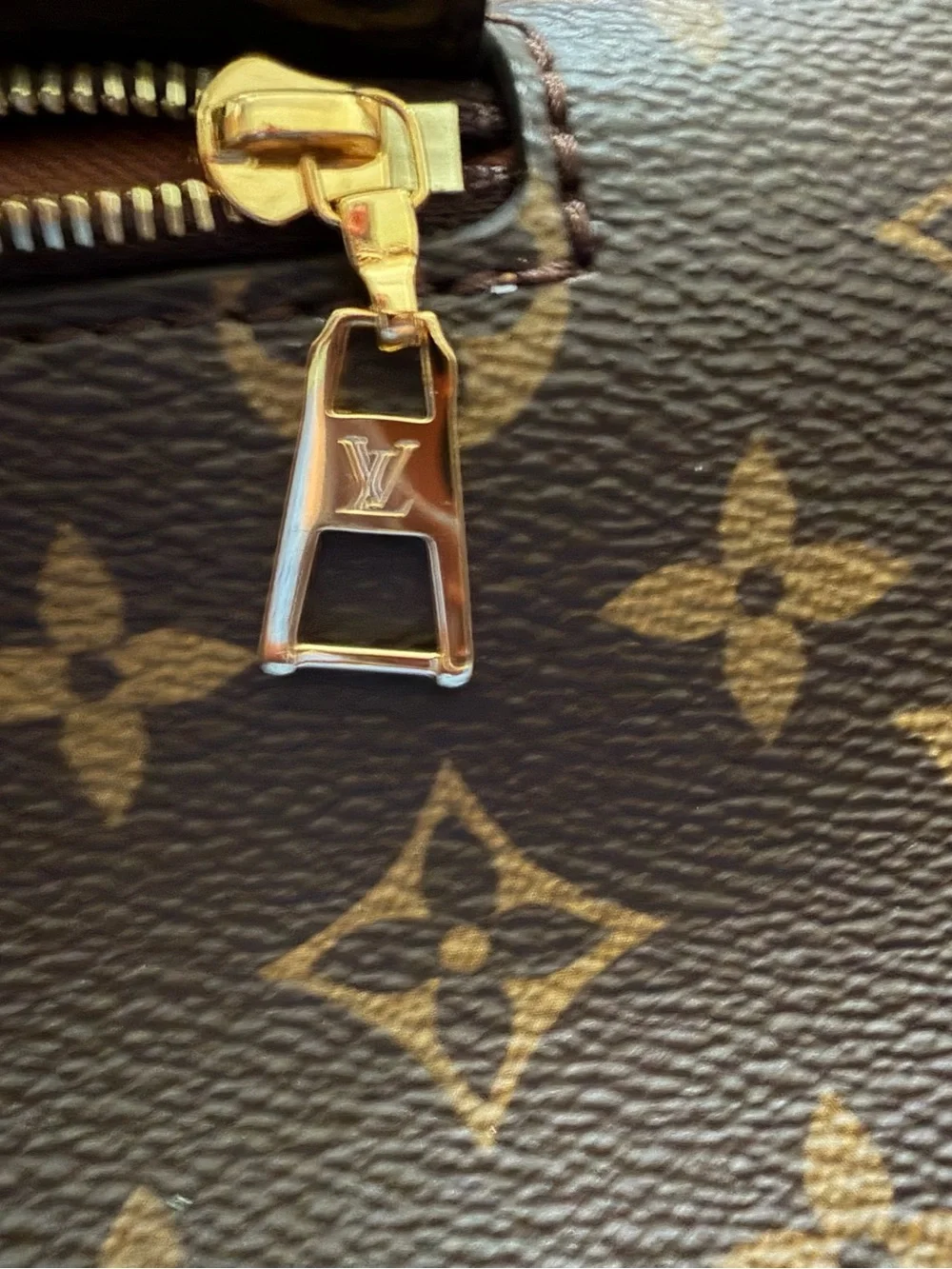 Louis Vuitton Monogram Canvas Backpack with Tan Leather Trim and Pink Charm